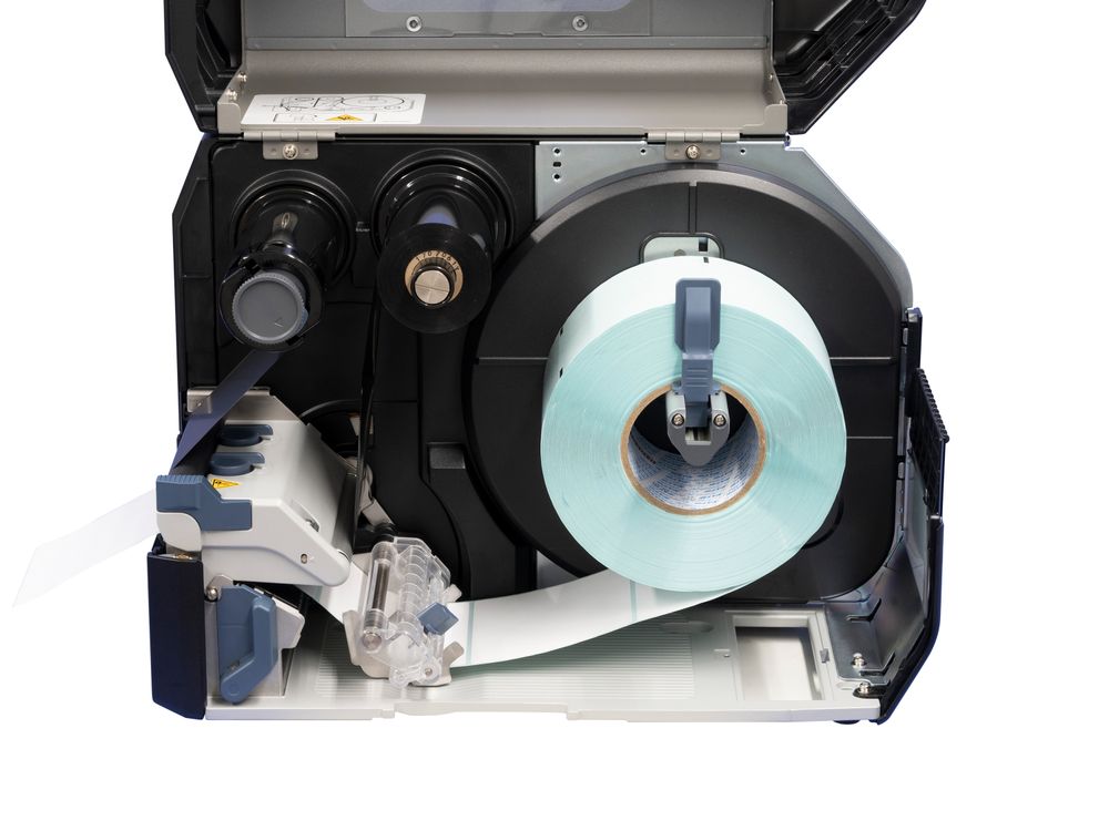 Sato CL4NX Plus etikettenprinter open met geplaatste etiketrol