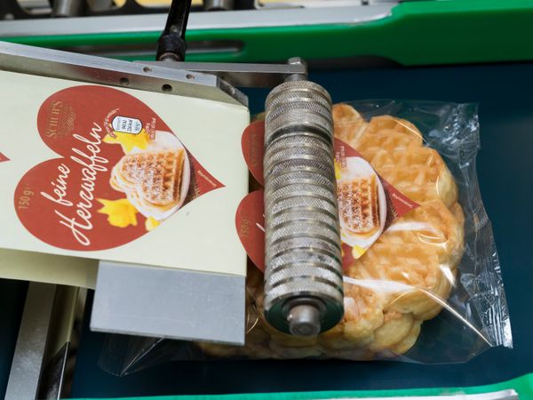 Alpha Compact-etikettering op voedselverpakkingen